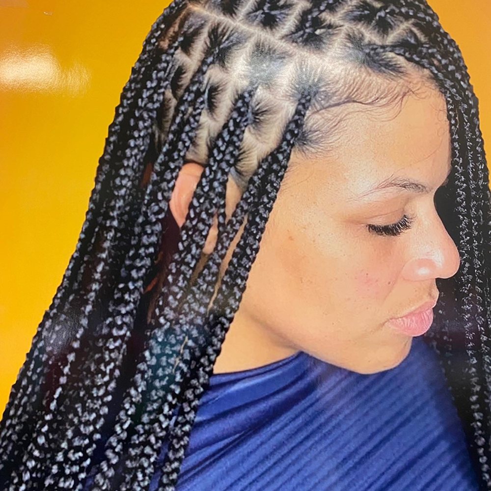 Professional knotless braids with neat square parts in DC - District Braids by Anna